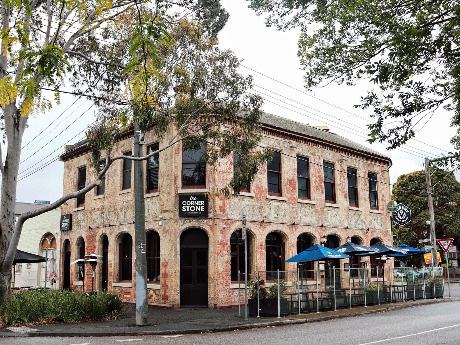 Exterior and outdoor tables at The Cornerstone Pub in Port Melbourne