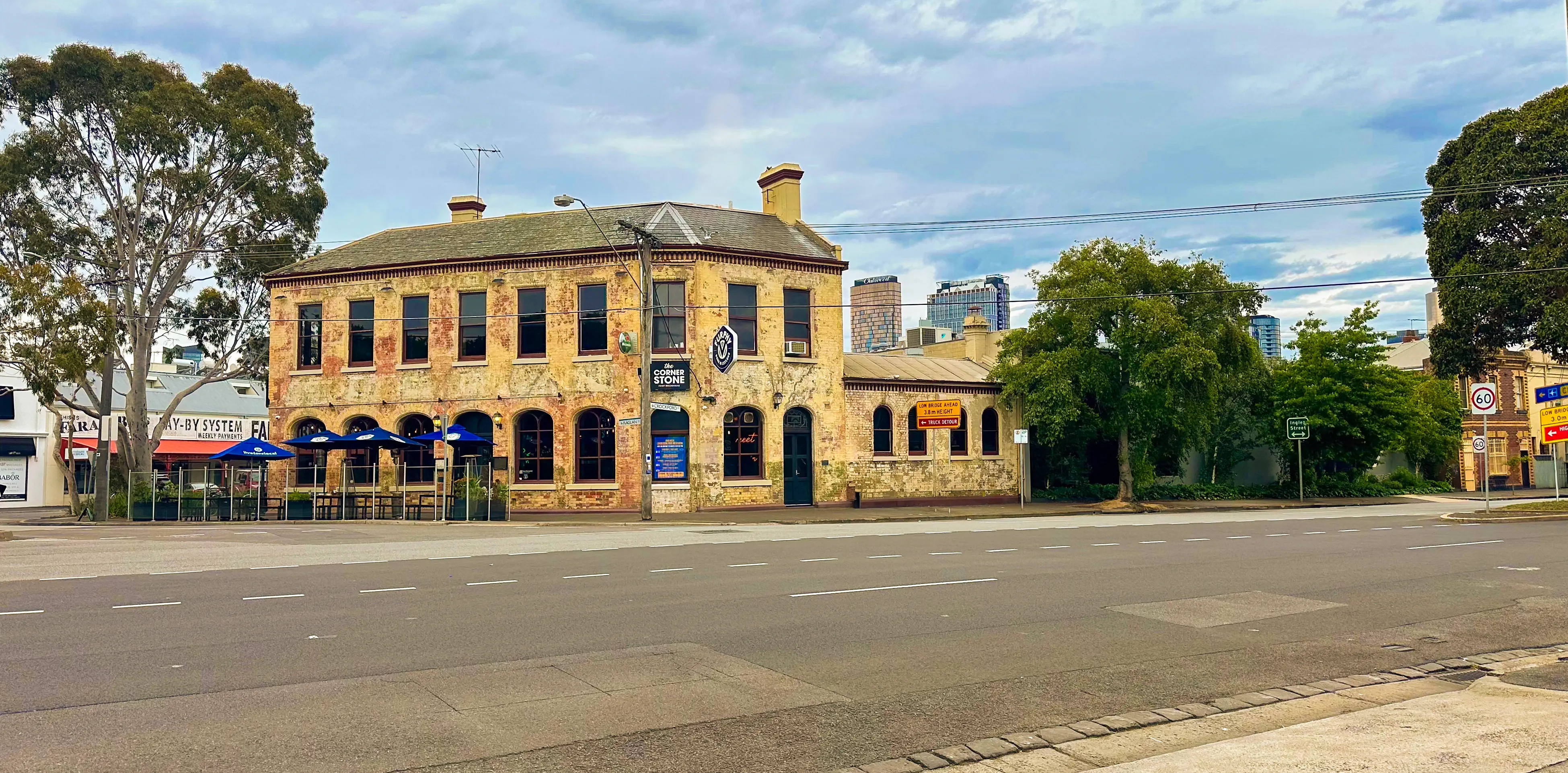 The Cornerstone Pub outdoor terrace and dining area in Port Melbourne, showcasing modern pub atmosphere and welcoming space